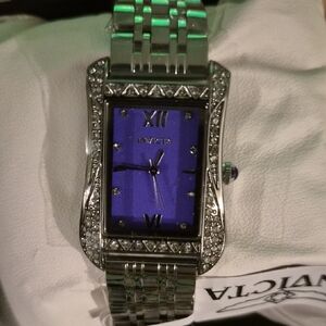 Invicta Silver Watch with Vibrant Purple Dial